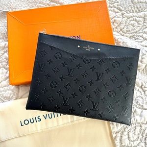 Fashion designer inspired pouch bag